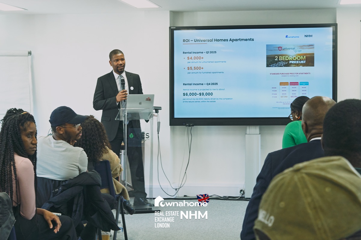 Uche presenting at a real estate event